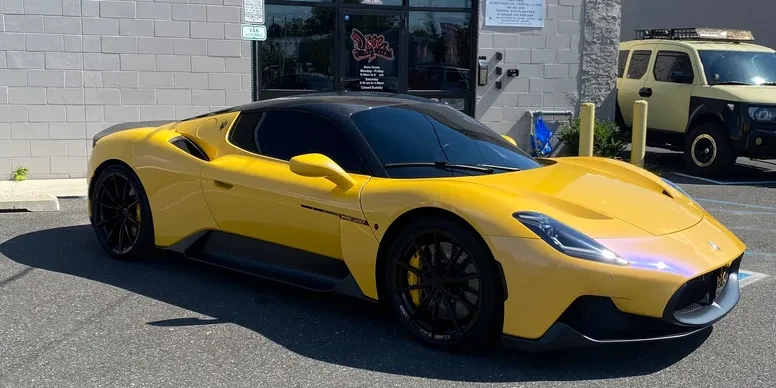 Yellow Maserati MC20 at Dope Window Tinting in Pennsauken, NJ.